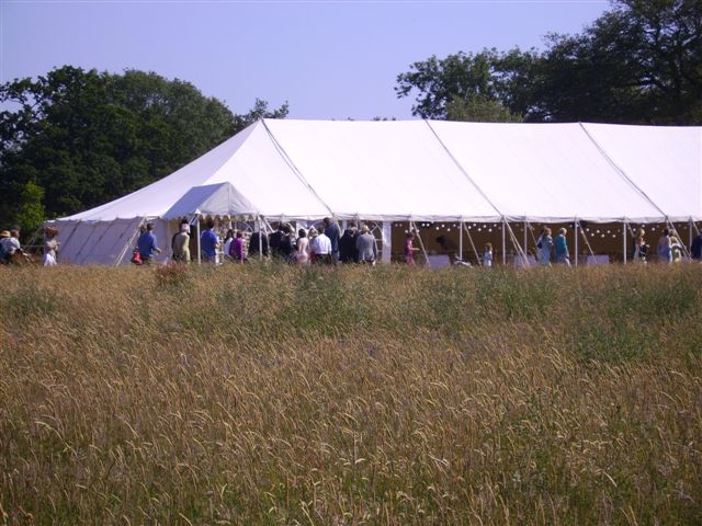 Canvas marquee in a summer meadow